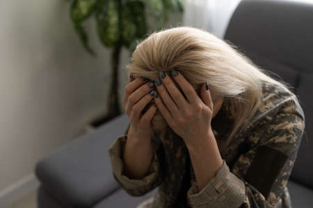 Photo of young woman wearing military uniformの写真素材