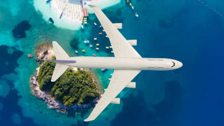 Airplane fly above beautiful nature landscape island, Tourism destination, Background for banner summer holiday vacation travel tripの写真素材