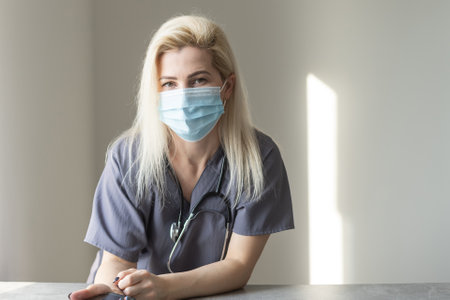 Young nurse portrait. Covid19, virus, health and medicine concept.の写真素材