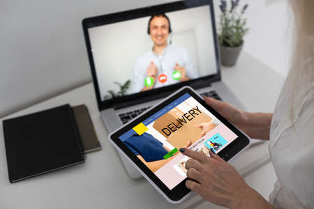 Laptop screen displaying a delivery tracking conceptの写真素材