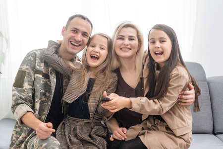 Portrait Of Soldier Returning Home With Familyの写真素材