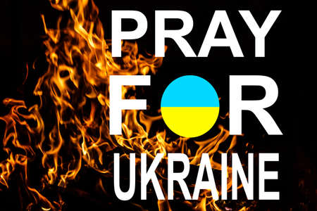 Pray for Ukraine, flag Ukraine with fire,の写真素材