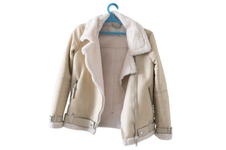 womens jacket on a hanger white background
