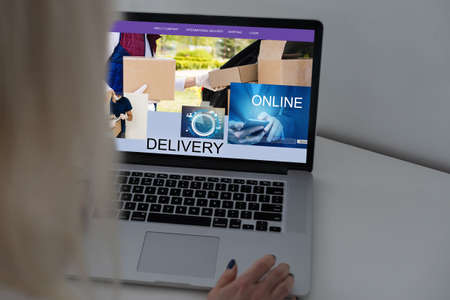 Online shopping. laptop with banner deliveryの写真素材
