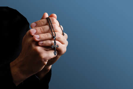 Praying hands with faith in religion and belief in God on blessing background. Power of hope or love and devotion.の写真素材