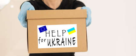 Humanitarian aid to Ukraine because of the war, Charity and assistance to people in need, refugee supportの写真素材