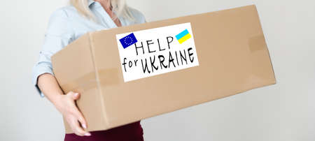 Humanitarian aid to Ukraine because of the war, Charity and assistance to people in need, refugee supportの写真素材