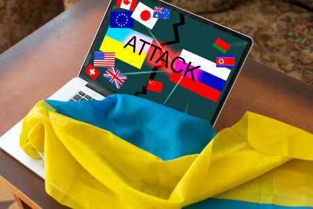 country flags and Ukrainian and Russian flag on the tabletの写真素材