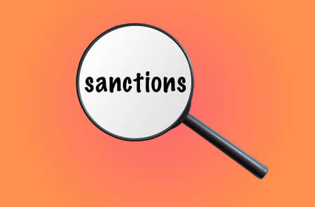 word Sanctions written on paper. the concept on the topic of sanctions in Russiaの写真素材