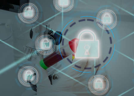 Security Health Care Concept. Medical Data Insurance and Safety. Medicine secure patient privacy history. Doctor offers heart with lock icon on virtual screen. Access healthcare protection technologyの写真素材