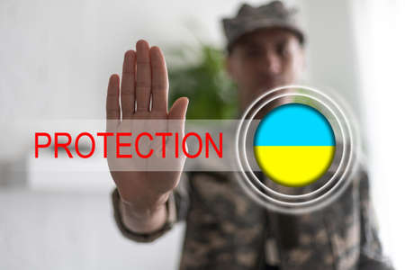 Ukraine flag and virtual button protectionの写真素材