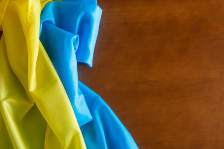 Wooden pattern old nature table board with Ukraine flagの写真素材