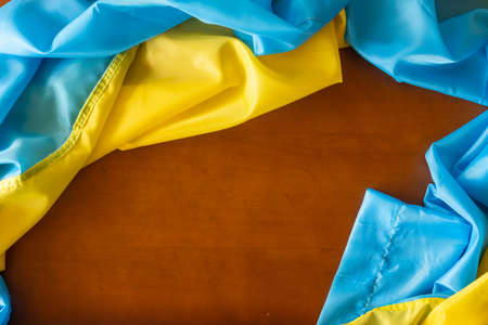 Wooden pattern old nature table board with Ukraine flagの写真素材