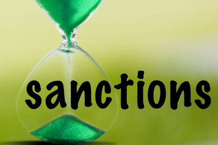 word Sanctions written on paper. the concept on the topic of sanctions in Russia