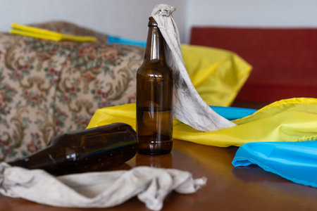 Molotov cocktail bottle on flag of ukraine background