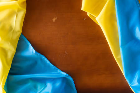 Wooden pattern old nature table board with Ukraine flagの写真素材