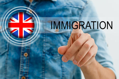Law and justice concept. the flag of Great Britain and inscription - IMMIGRATION