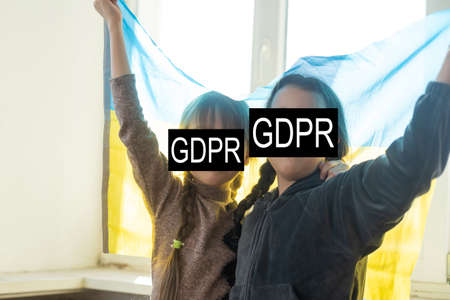 a large family of people behind the inscription GDPR. General data protection regulation. Cyber security and privacyの写真素材