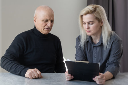 Image of young psychiatrist and her elder patient