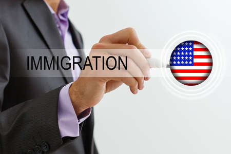 usa flag and inscription immigration, virtual buttonの写真素材