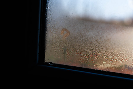 Wet window after autumn or winter rain