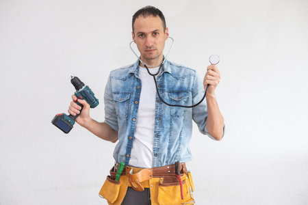 mechanic working with a stethoscope isolated on white background