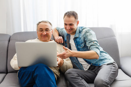 Two men in living room talking