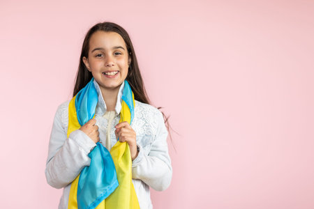 little girl with the flag of Ukraine