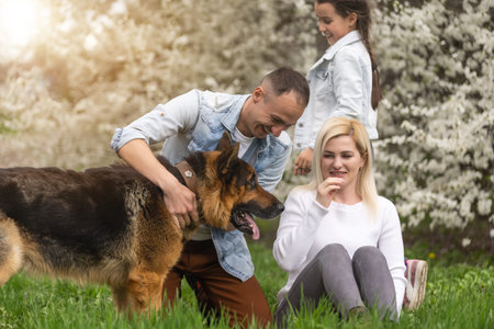 Happy family having picnic in nature. Smiling family picnicking in the park. spring nature