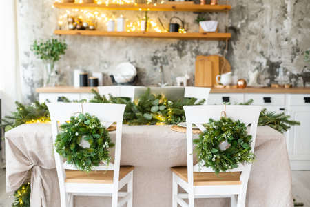 Merry Christmas and Happy Holidays. Time of family tea party. Christmas wooden table.の写真素材