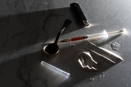 Syringes, drugs, heroin, and cooked.