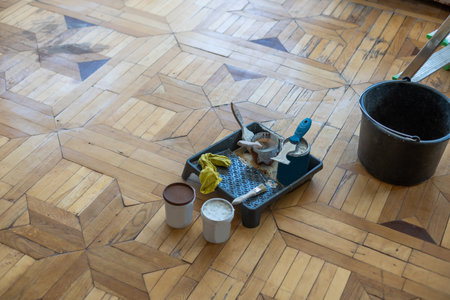 Renovated brown oak parquet, Reconstruction old house symbol, Wooden oak parquet floor background.の写真素材