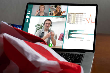 laptop with video chat, flag of the usaの写真素材