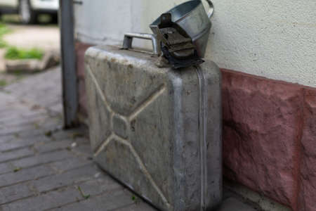 fuel canister and watering canの写真素材