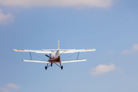 Small airplane against blue sky