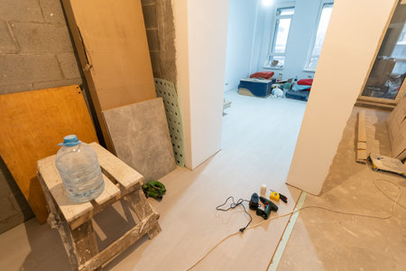 Interior renovation of a residential apartment using drywall without painting. Construction work indoors, renovation process inside the houseの写真素材