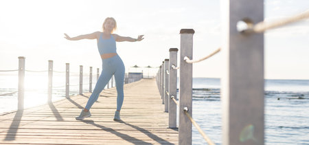 woman doing yoga outdoors in the hotel