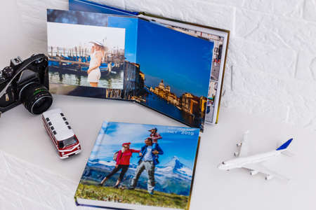 Photobook Album with Travel Photo with toy bus and plane. photo bookの写真素材