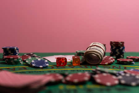 cards on a green cloth Casino tableの写真素材