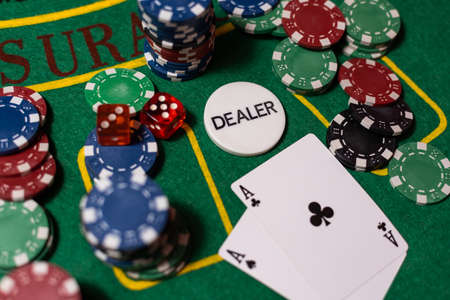 cards on a green cloth Casino tableの写真素材