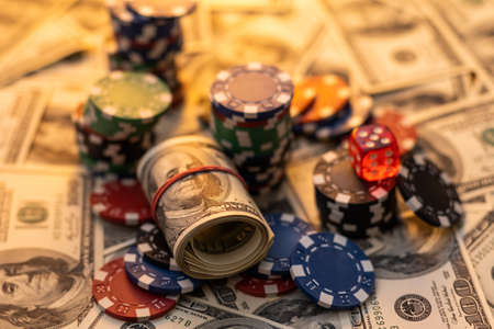 poker chips and money, dollars.の写真素材