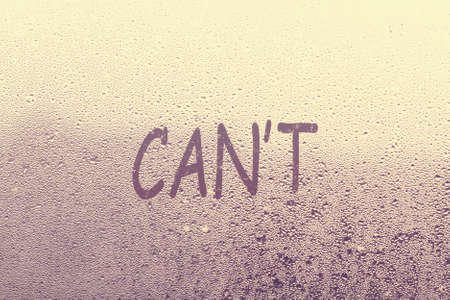 cant written on a foggy windowの写真素材