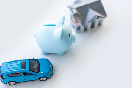pig piggy bank, toy car, houseの写真素材