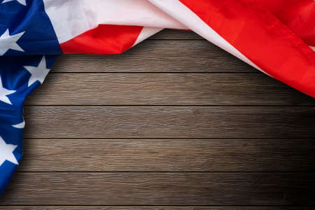 United States Flag on a rustic wooden table with copyspaceの写真素材