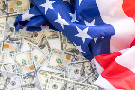 American flag and banknotes USD currency money.の写真素材