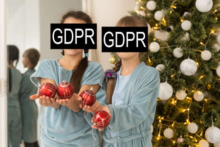 GDPR (general data protection regulation) concept. Businessman or IT technologist with text GDPR and icons of peopleの写真素材