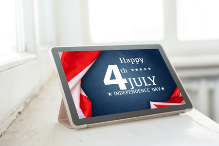 man searching website with information of the celebration of Independence Day hands of a man looking...