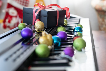 New Years composition on a musical synthesizer. lights of a garland. Merry Christmas greeting card....