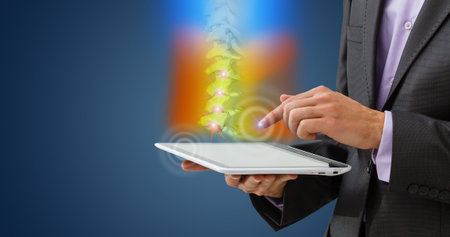 Tablet. X-ray of a patients pelvis, hip joint skeleton, medical concept. Pelvic pain, fracture,...