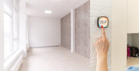 Thermostat smart home domotic control panel on wall for winter house temperature banner panoramic....